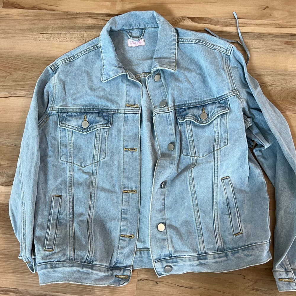 Denim jacket with fringe